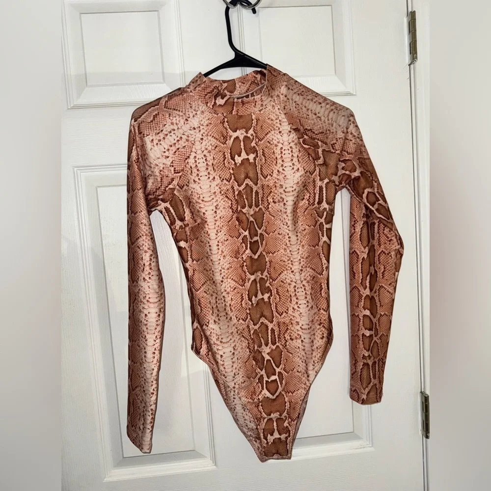 Wild Desires Tan Snake Print Long Sleeve One-Piece Swimsuit
Lulus - Picture 3 of 7